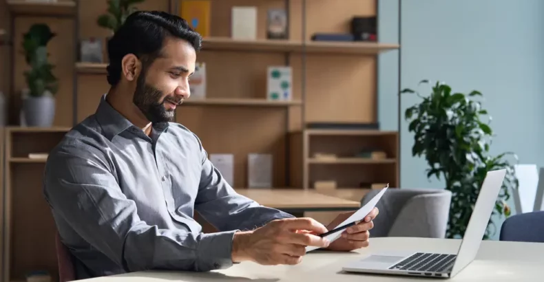 Man looking at a laptop